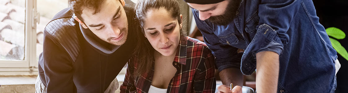 Group of students discussing an assignment